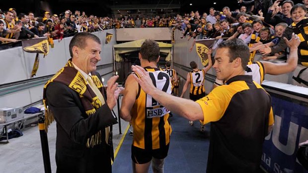 Jeff Kennett with Hawthorn coach Alastair Clarkson after the Hawks squeaked past Adelaide in a 2012 preliminary final.