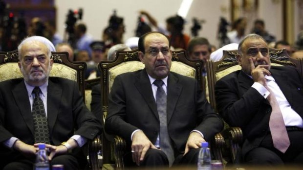 Iraq's Prime Minister Nouri al-Maliki, centre, is under intense political pressure to step aside as the country's factions struggle to form a new government.