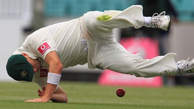 Rare blemish: Peter Siddle drops a chance during Australia's comfortable win at the SCG yesterday.