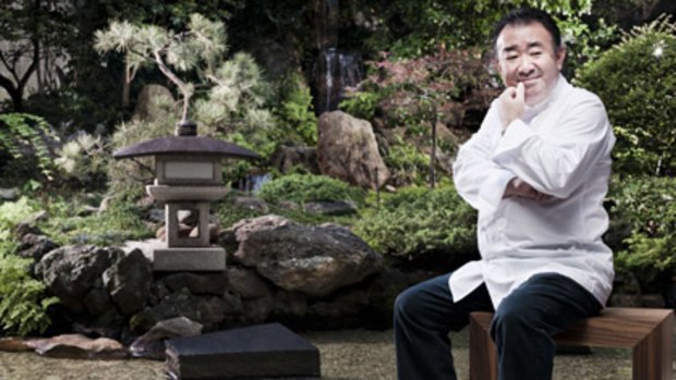 The thought had crossed his mind . . . Tetsuya Wakuda sans hat in the Japanese garden at his Kent Street restaurant, but there are still two hanging around.