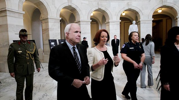 Prime Minister Julia Gillard and US Senator John McCain meet in Washington at an exhibition marking the 60th anniversary of the ANZUS Treaty.