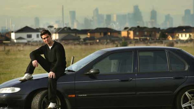 Martin Chiriano, of Werribee, and his old Falcon. Soaring petrol prices have hit hard.