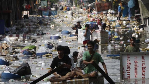 Factories have been closed down in the flood-affected areas north of Bangkok.