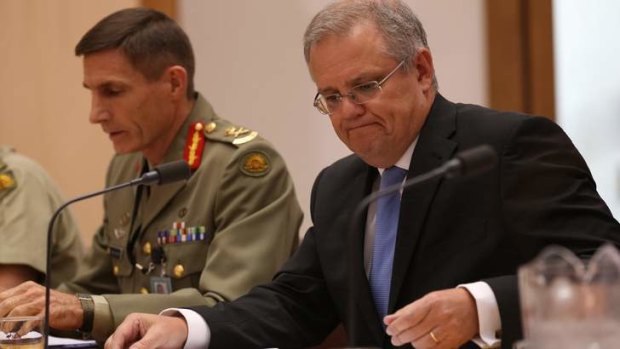 Immigration Minister Scott Morrison and Lieutenant-General Angus Campbell appear before the Senate committee on Friday.