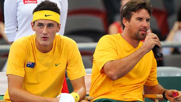 Bernard Tomic with Pat Rafter during the Davis Cup Asia Oceania Zone second round tie between Australia and South Korea in April this year.