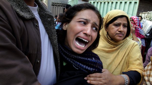 A Pakistani Christian woman grieves for a family member killed in one of the attacks in Lahore.
