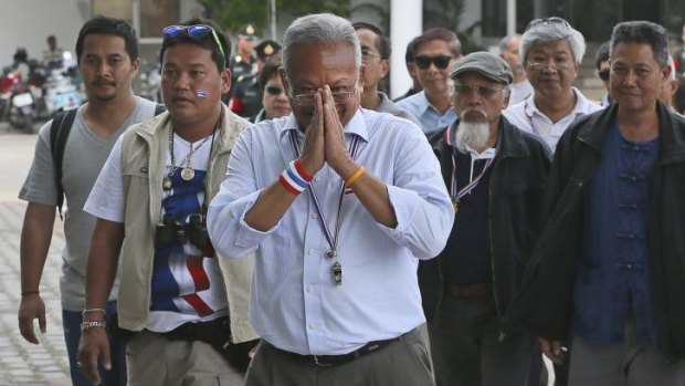 Urging intervention: Protest leader Suthep Thaugsuban, centre, with supporters at a meeting with armed forces in Bangkok.