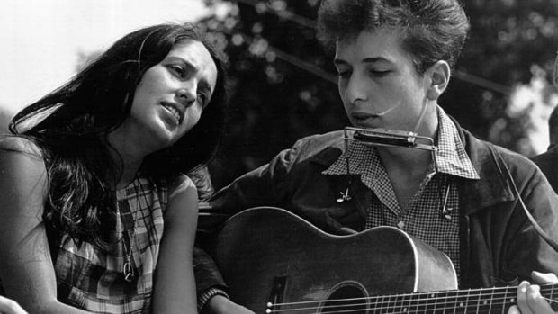 Joan Baez and Bob Dylan perform during a civil rights rally in Washington D.C., 1963.