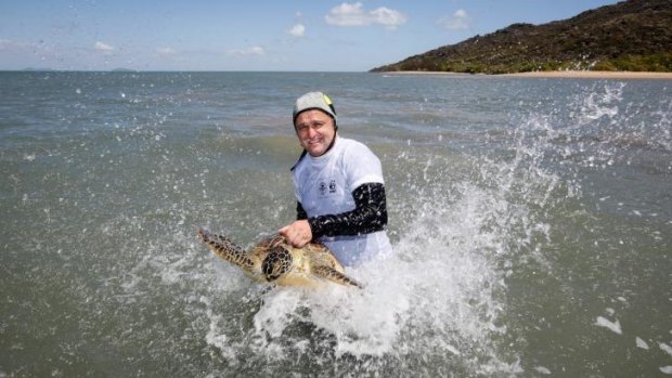 Christophe Tourenq Wetland Manager, Banrock Station with a Green Turtle.