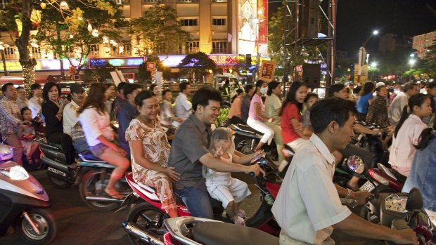 Not for the faint-hearted: Scooters at night, Ho Chi Minh City, Vietnam.