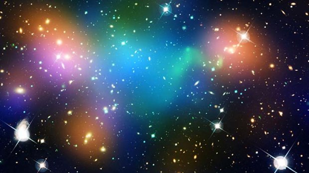 Dark matter, galaxies, and hot gas in a galaxy cluster.