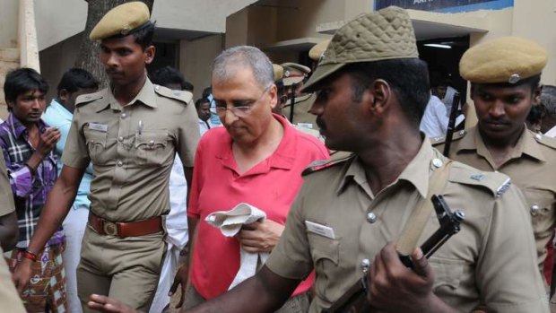 Alleged smuggler of Indian antiquities Subhash Kapoor is escorted into court last Tuesday.