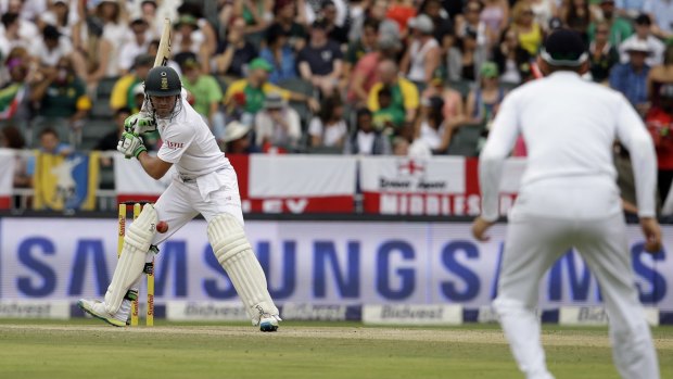 South African captain A.B. de Villiers is trapped in front by Stuart Broad.