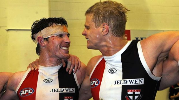 Lenny Hayes and Nick Riewoldt celebrating a finals win over Geeelong in 2010.