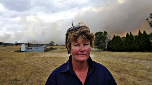 Yalgatta resident Rhonda McCarthy waits on instructions from the RFS after she was evacuated from her home on Tuesday.