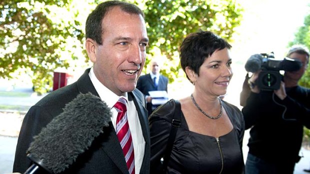 Mal Brough arrives with his wife Sue for today's LNP Fisher preselection at Caloundra RSL.