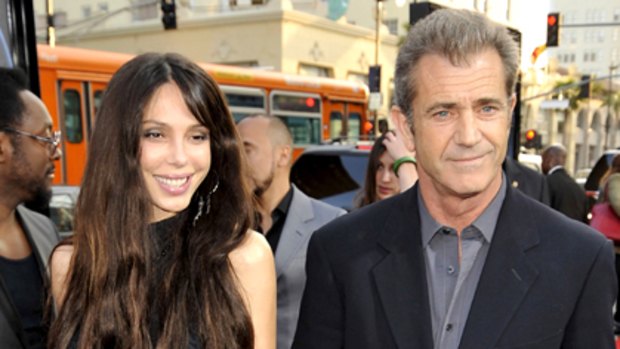 Short, dark and handsome ... Mel Gibson with partner Oksana Grigorieva.