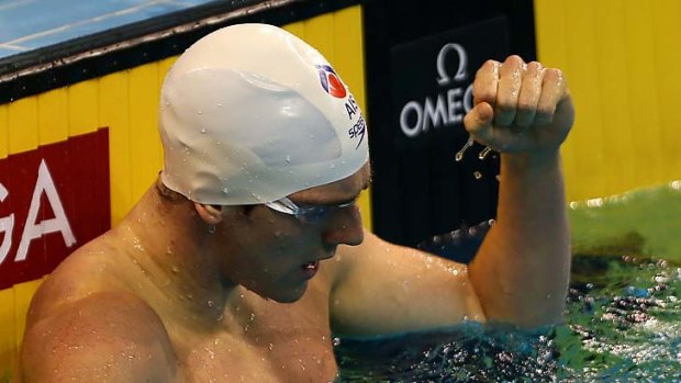Tommaso D'Orsogna celebrates after winning the men's 200 metres freestyle.