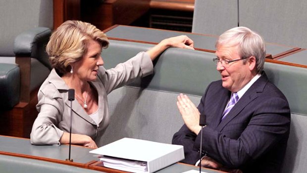 Catching up ... Deputy Opposition Leader Julie Bishop chats with Kevin Rudd, now a Labor backbencher, in federal Parliament.
