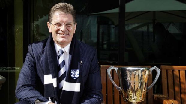 Geelong fan Premier Ted Baillieu with the AFL Premiership Cup.
