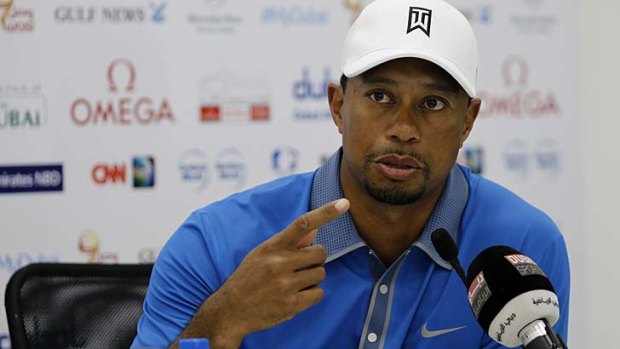 Tiger Woods speaks to the media at the Emirates Golf Club in Dubai on Wednesday.