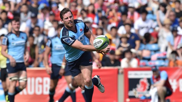 One step at a time: Bernard Foley of the Waratahs in action against the Sunwolves.