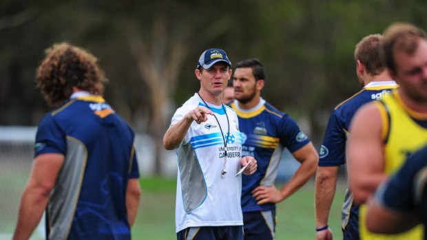 Stephen Larkham will stay with Brumbies despite being linked to the Wallabies job.