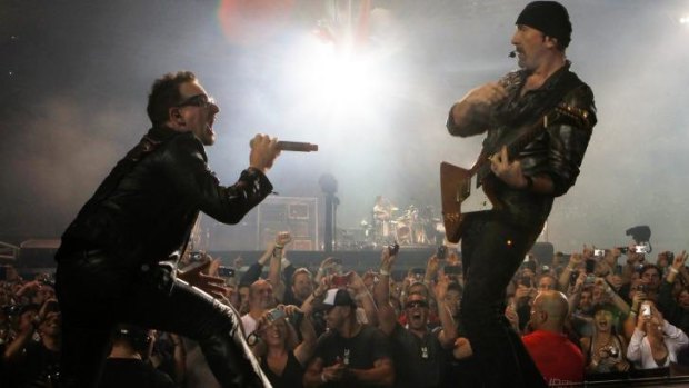 U2's Bono and The Edge perform at Etihad stadium in 2010.