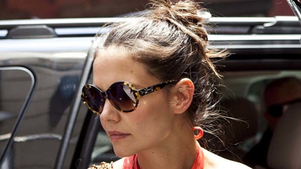 Actress Katie Holmes ... "sick and tired" of playing Pinocchio to Tom's Geppetto.