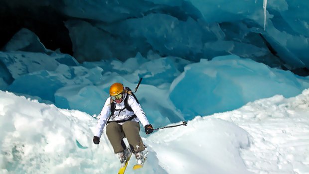 A skier takes on Greeland's rugged terrain.