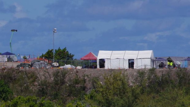 Tents set up hastily at the second processing centre, Black Soil, which is under construction.