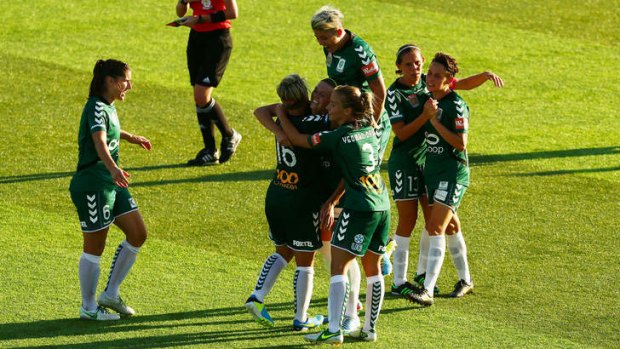 Times to perfection: Canberra United celebrate their win over Sydney FC.