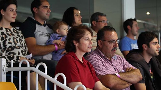 Emotional: the Mannah family watch on.