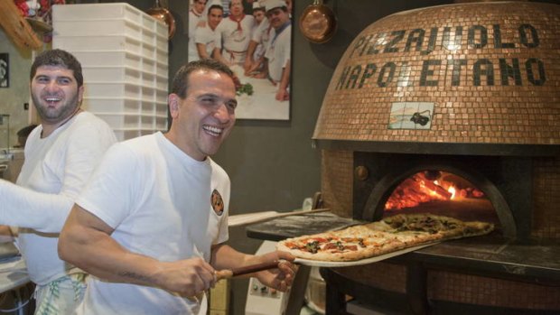 Hot stuff ... owner-chef Luigi Esposito with his wood-fired pizza oven.
