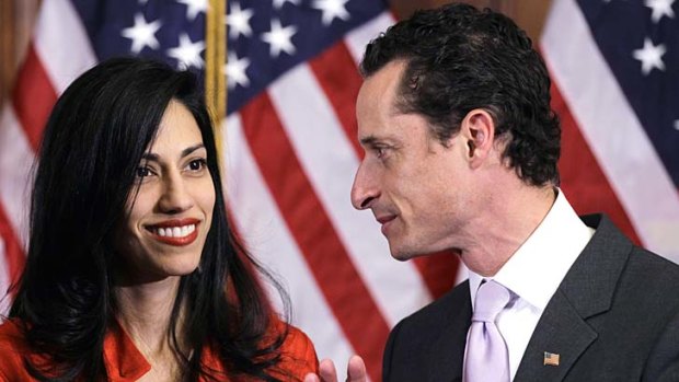 Standing by her man: Huma Abedin and her husband Anthony Weiner.