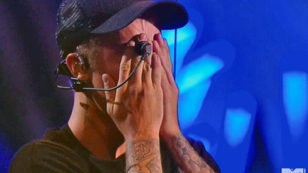 Emotional ...  Bieber breaks down after his performance at the VMAs. 