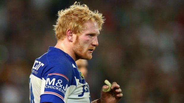 Hard, but fair: Former referee Bill Harrigan says there's nothing wrong with James Graham's tackling technique.