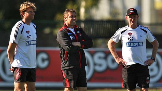 Former Geelong assistant coach, Brendan McCartney, with James Hird and Mark Thompson at Essendon.