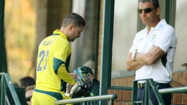 Michael Clarke returns to the dressing room after Australia's innings against Zimbabwe.