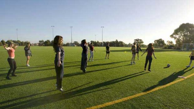 Mill Park Secondary College students at soccer training with Shaun Isbister. <i>Picture: Simon O'Dwyer</i>