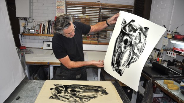 Lithographer Peter Lancaster prints Under Wraps by Jim Pavlidis.
