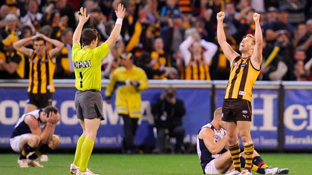 Hawthorn's Sam Mitchell reacts to the final siren.