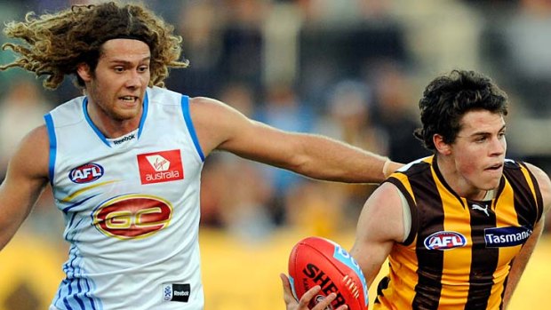 Hawthorn showed Gold Coast a clean pair of heels in round 13.