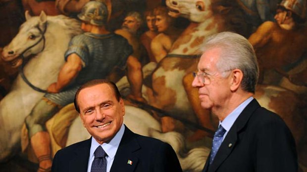 Italy's Prime Minister Mario Monti, right, and Silvio Berlusconi last year.