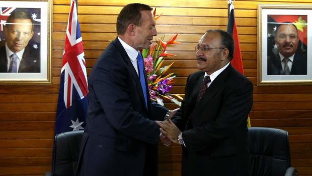 Backflip of refugee resettlement: Prime Minister Tony Abbott and PNG Prime Minister Peter O'Neill.