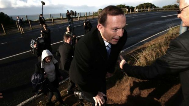 Tony Abbott pictured during the election campaign at the Great Ocean Road to announce funding for works.