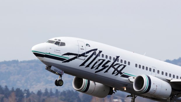 'Pay it forward': A kind gesture from an Alaska Airlines employee has helped a stranded passenger fly home.