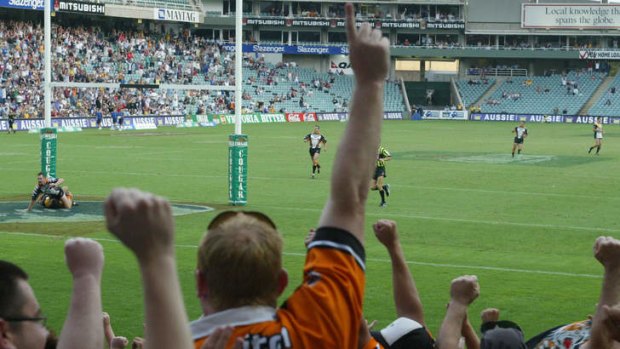 Title defence: Pat Richards scores to win the World Sevens for the Tigers a decade ago.