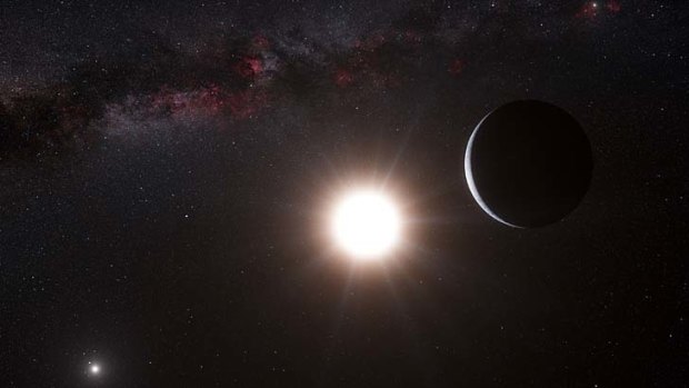An artist's impression made available by the European Southern Observatory shows a planet, right, orbiting the star Alpha Centauri B, centre, a member of the triple star system that is the closest to Earth. Alpha Centauri A is at left. The Earth's sun is visible at upper right.