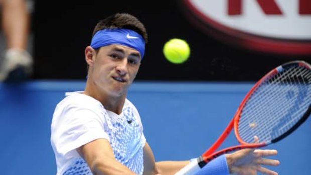 Bernard Tomic shows the maturity to take advantage of a disappointing opponent.
